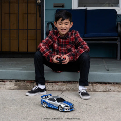 Jada 1:16 Fast & Furious Brian's 2002 Nissan Skyline GT-R (BNR34) Uzaktan Kumandalı Araba 2.4 Ghz USB Şarj 29 cm | 6 Yaş ve Üzeri Çocuklar İçin