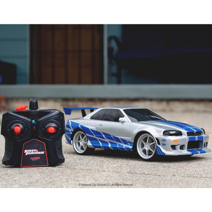 Jada 1:16 Fast & Furious Brian's 2002 Nissan Skyline GT-R (BNR34) Uzaktan Kumandalı Araba 2.4 Ghz USB Şarj 29 cm | 6 Yaş ve Üzeri Çocuklar İçin